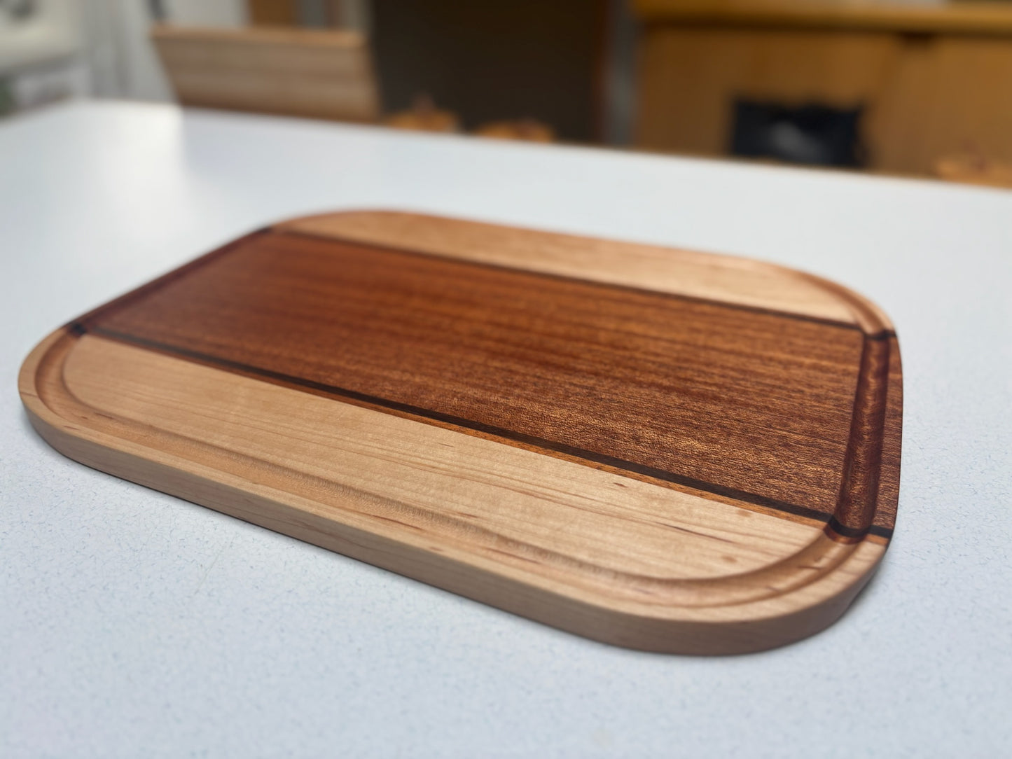 Medium Cutting Board- African Mahogany, White Maple, Black Walnut Accents