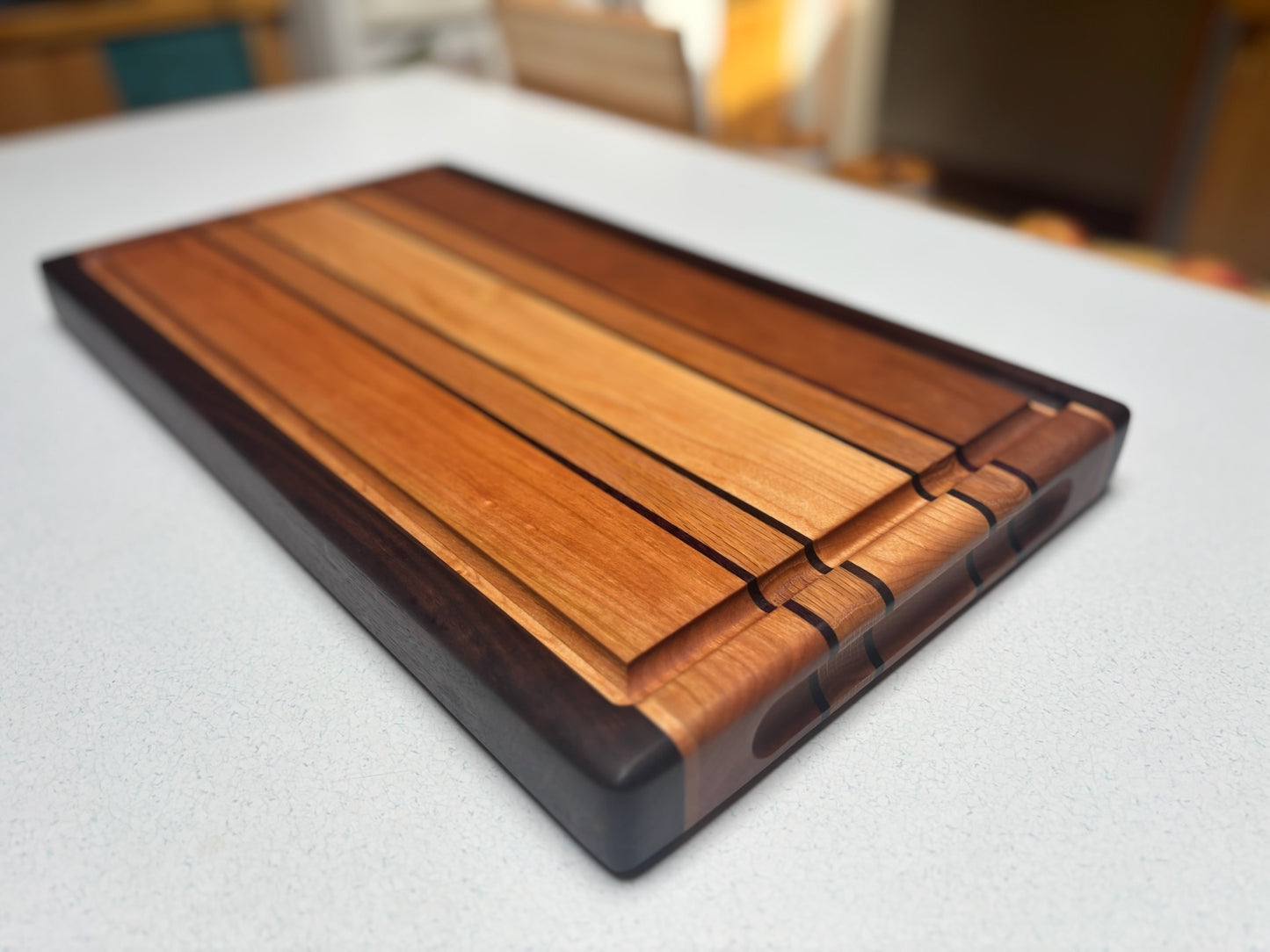 Medium Butcher Block- Cherry, Maple, Black Walnut and Red Oak with Black Walnut accents.