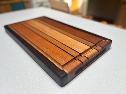 Medium Butcher Block- Cherry, Maple, Black Walnut and Red Oak with Black Walnut accents.