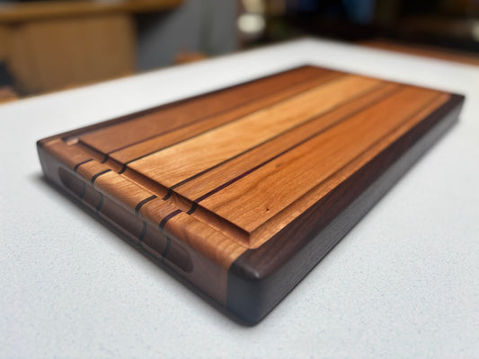 Medium Butcher Block- Cherry, Maple, Black Walnut and Red Oak with Black Walnut accents.